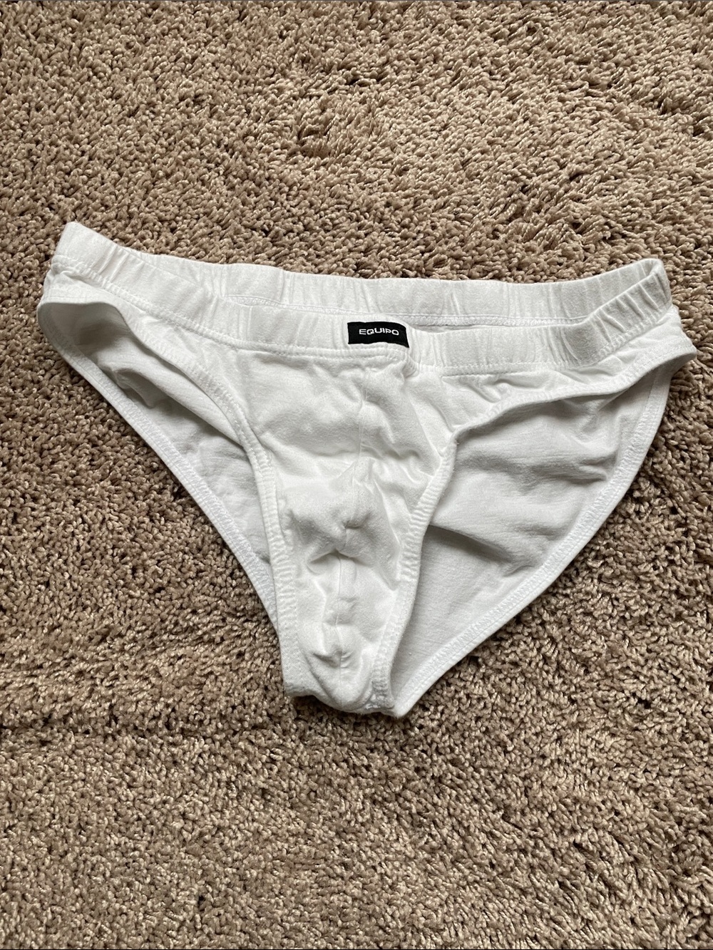 Gently worn white Equipo bikini briefs size large